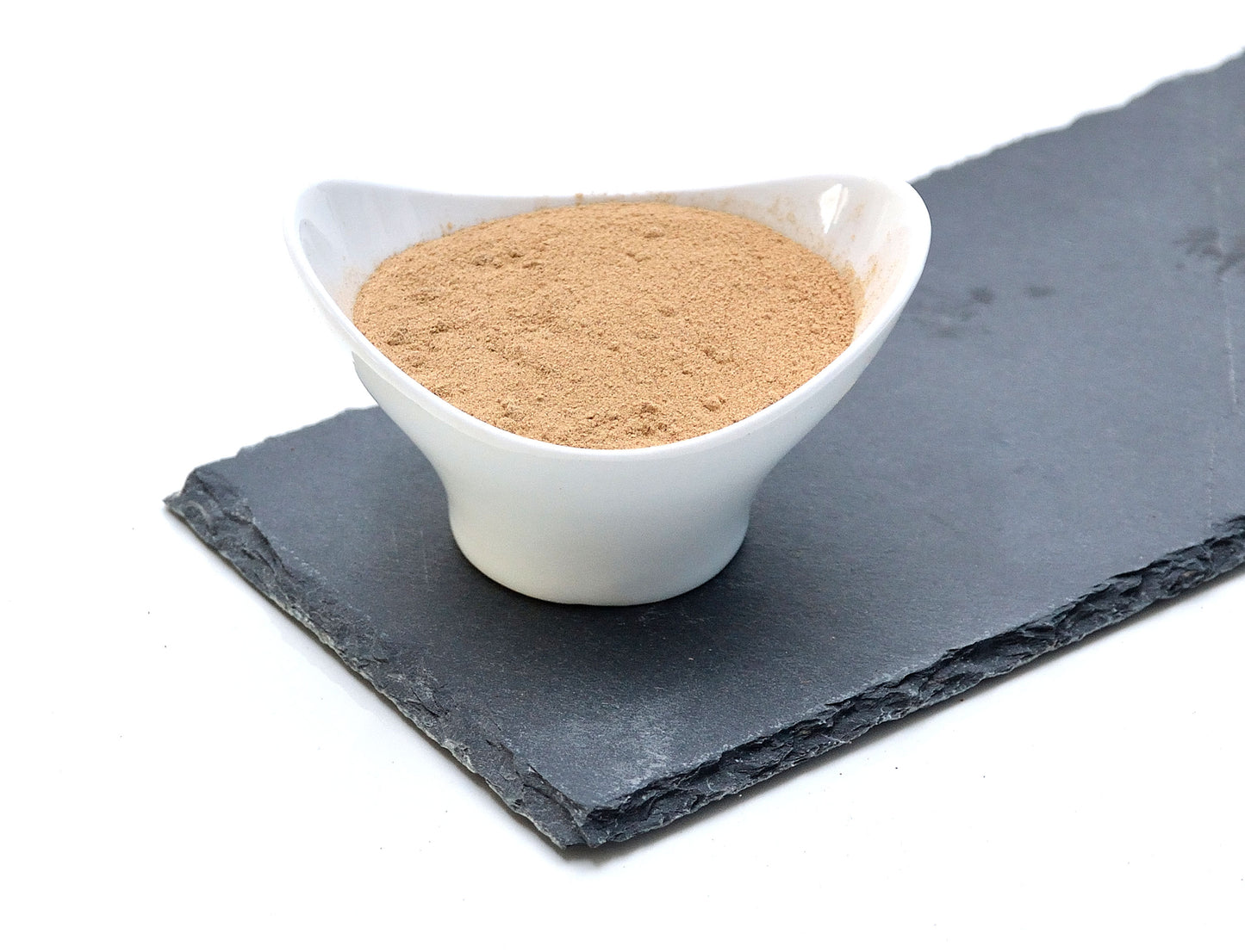 Eine Schale Zitronenschalenpulver